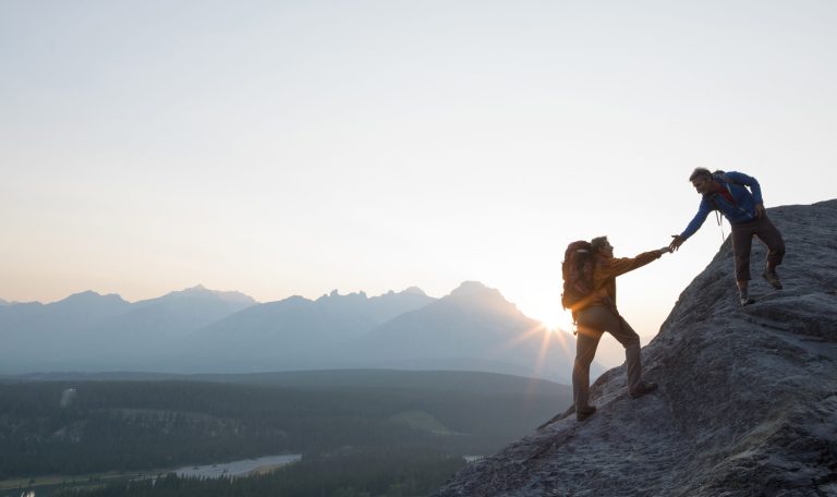 Individuals hiking and learning about their core connections and triggers