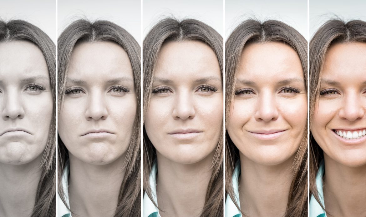 Woman emotions range from extremely sad to extremely happy. Sad and happy woman face. Young lady expressing different emotions. Mood disorders, bipolar disorder. Emotional contrast