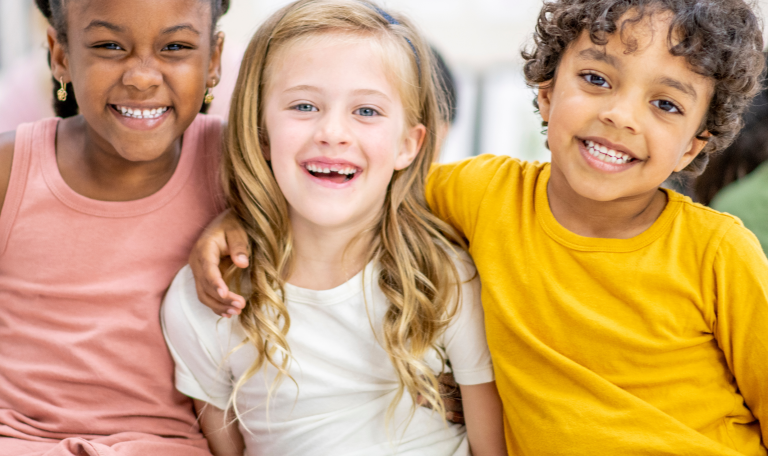 three children smiling