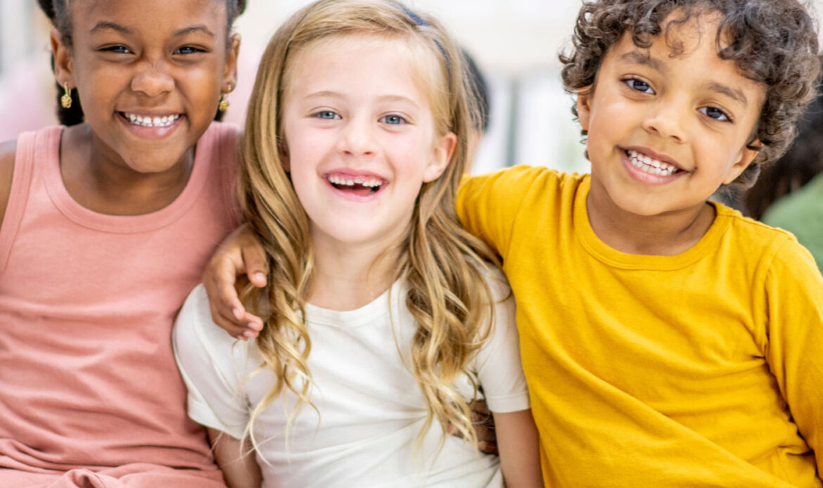 three children smiling