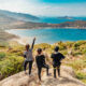 Three women on a mountain summit