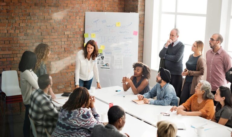 a group of people learning how to be mentally strong at a reset event