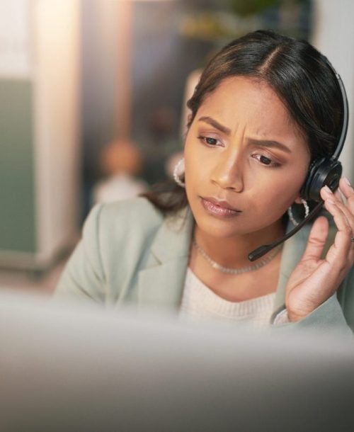 Mentally STRONG customer service agent assisting a caller.