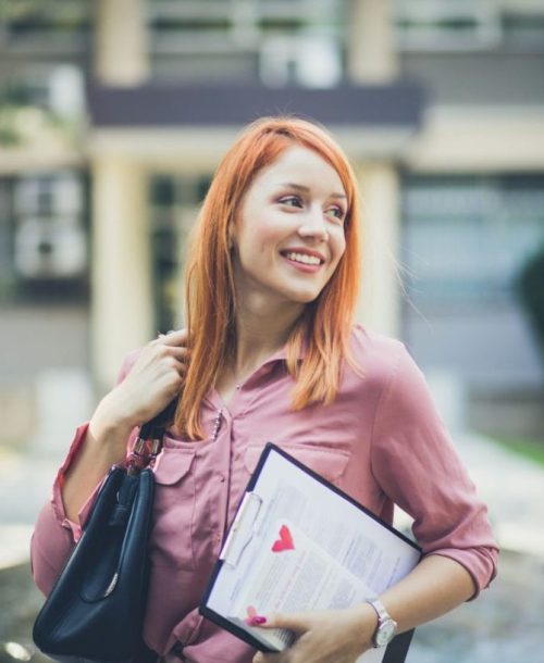 Smiling woman representing a Mentally STRONG ambassador.