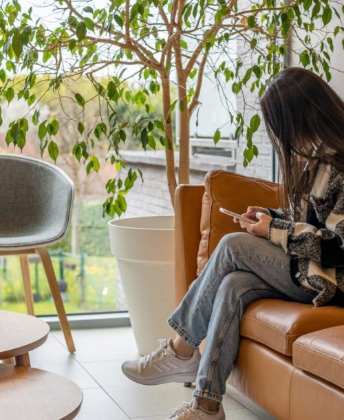 Young woman seated in the Mentally STRONG clinic.